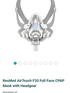 ResMed full-face CPAP mask in light gray and clear